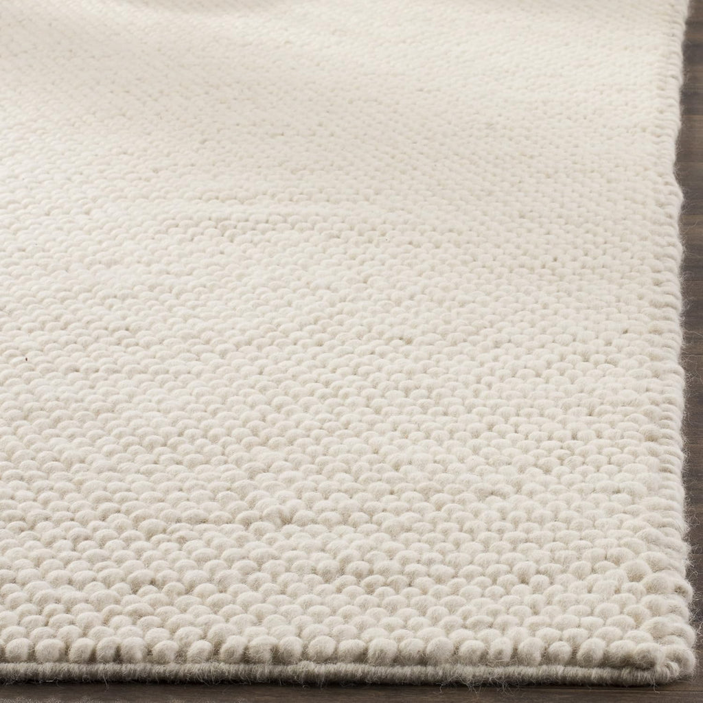 Hand‑Knotted Ivory Wool Indoor Area Rug